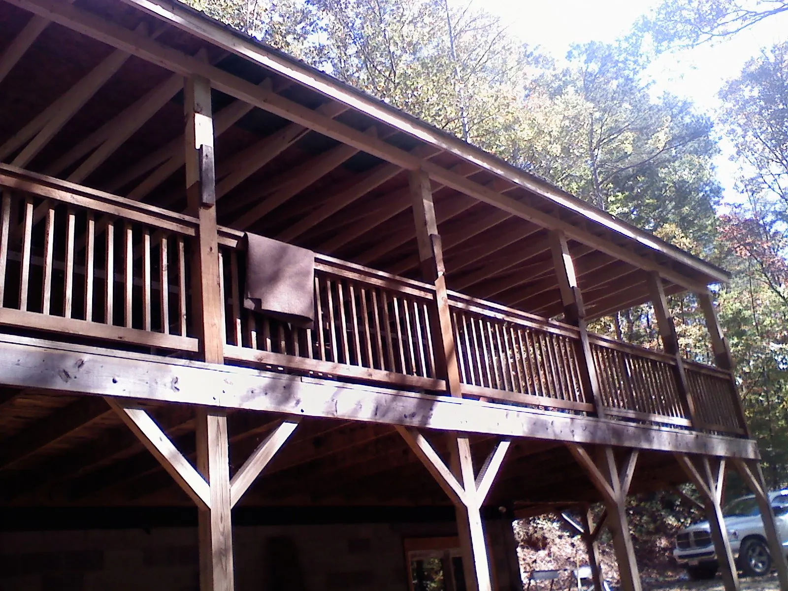 Timber framing under a new elevated porch and deck — Roof Leak Repair in Shiloh by Roofing Brothers